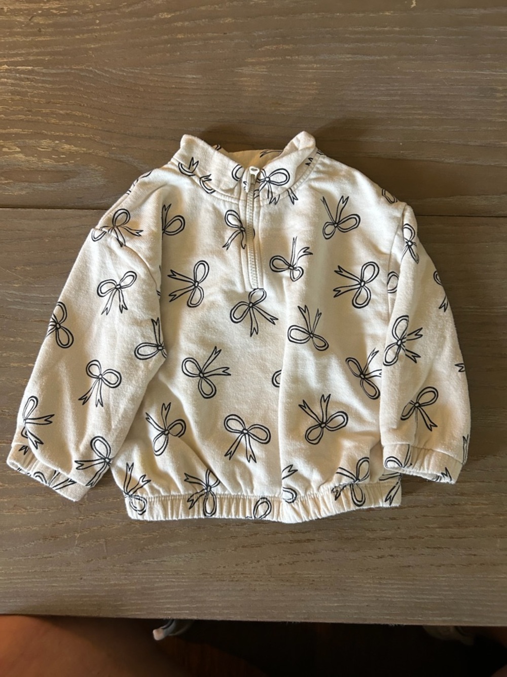 Cat & Jack Cream Zip-Up Hoodie with Black Bow Print